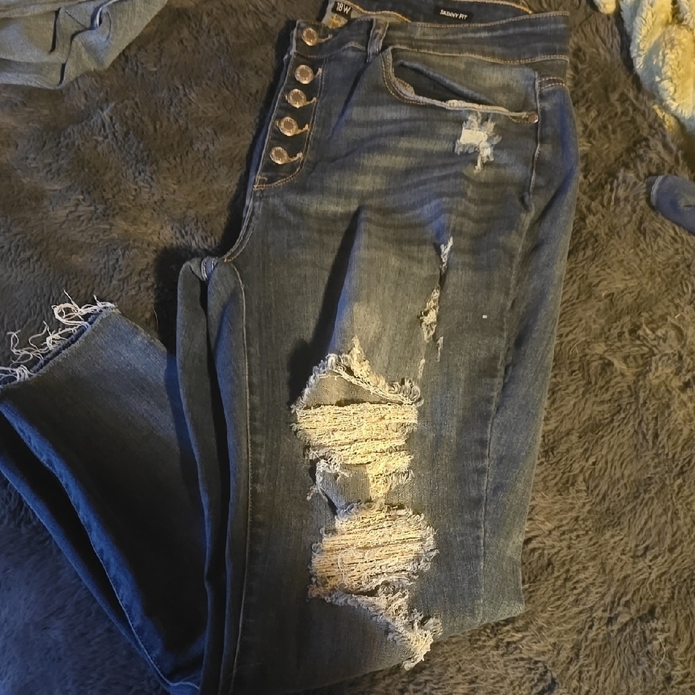Distressed Blue Jeans